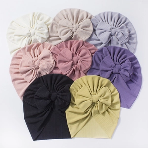 Lot de 8 bonnets turban pour bébé aux couleurs variées avec grands nœuds et maille