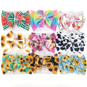 Baby Stirnbänder Set mit bunten Sonnenblumen und Regenbogenmustern auf Waffelstoff