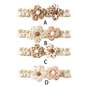 Detail view of four styles of infant elastic lace headbands with diverse floral patterns