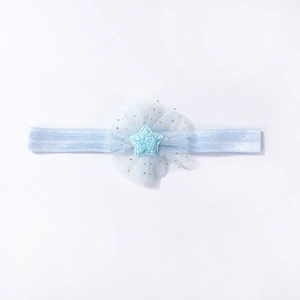 Elastic light blue baby headband featuring sparkly stars and golden polka dot mesh lace
