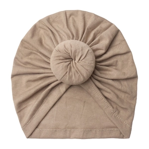 Soft cotton baby turban donut hat in khaki with center knot design and breathable knit fabric