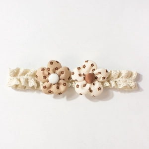 Lace baby headband with two delicate floral fabric flowers for newborn photography props