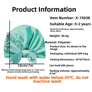 Detailed view of mint green velvet baby turban with pearls and size measurement
