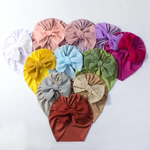 Turbans pour bébé avec nœud en mousseline en plusieurs couleurs et tissu côtelé extensible