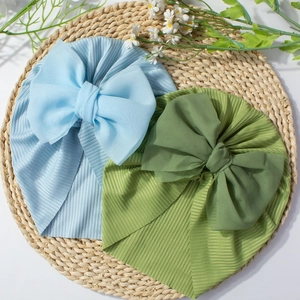 Bandeaux pour bébés avec grands nœuds en mousseline en bleu ciel et vert olive doux