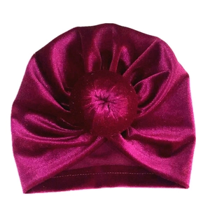Infant velvet turban hat in deep red with donut knot and pleated design for autumn