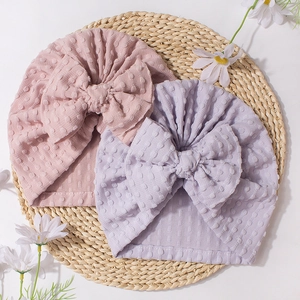 Solid baby turban hats with cute large bows and breathable popcorn texture fabric