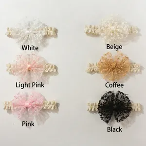 Detail of 6-pack baby lace headbands featuring mesh embroidery bows in multiple colors