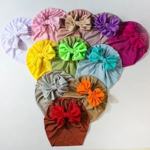 Soft ribbed baby turban hats set with large bow decoration in eleven assorted vibrant colors