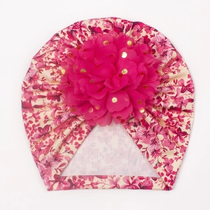 Turbant rose pour bébé avec motif floral, grande fleur en mousseline et sequins dorés