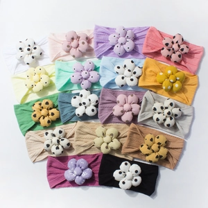 Set of 16 colorful baby headbands with soft rib knit fabric and 3D floral polka dot patterns