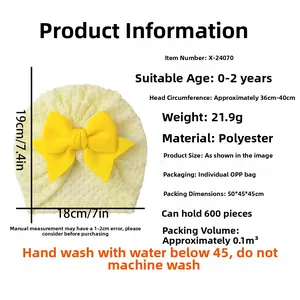 Detailed sizing chart and soft knit fabric texture of a yellow baby bow beanie hat