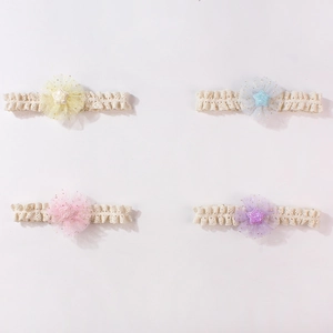 Set di quattro fasce per neonati in pizzo con stelle di paillettes e fiori in mesh colorati