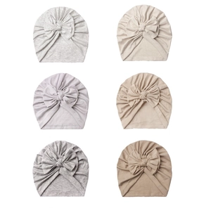 Soft cotton baby turban hats with large bows in a 6-pack assorted color set for infants