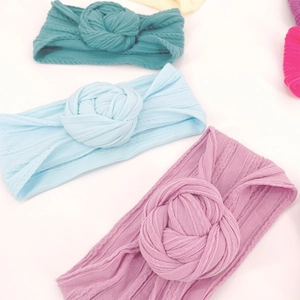 Set di fasce per neonati in nylon morbido con nodi floreali in toni macaron