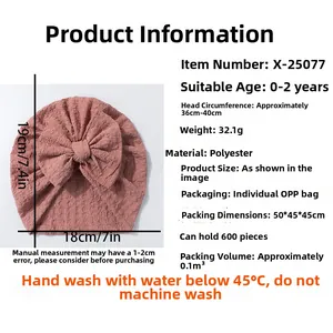 Detailed sizing guide for baby turban hat featuring pink bow design and soft material