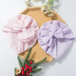 Soft crinkle fabric baby hat set with large bows in pink and purple colors