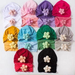 Set of newborn cotton flower turban hats and headbands in various bright colors