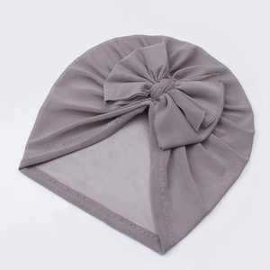 Soft mesh baby turban hat in dusty purple with a large decorative front bow