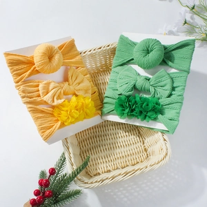 Lot de trois bandeaux pour bébé avec nœuds en tricot souple, couleurs jaune et vert