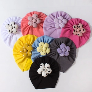 Set of 8 colorful baby turbans with large flower petals and breathable knit fabric