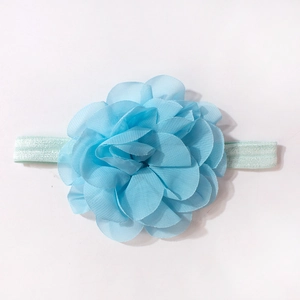 Detail of light blue handmade chiffon flower headband with elastic soft band for infants