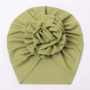 Green baby turban hat with a large floral knot made of ribbed stretch knit fabric