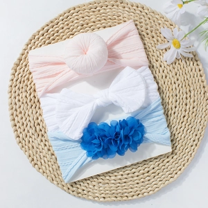 Lot de 3 bandeaux pour bébé avec nœuds et fleurs 3D sur un tissu élastique texturé