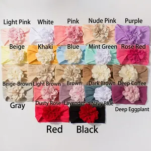 Détail de 22 coloris de bandeaux bébé extensibles avec de grandes fleurs en tissu faites main