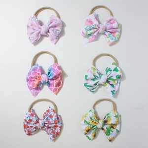 Set da 6 fasce per neonati in nylon con fiocchi floreali e tessuto con trama a nido