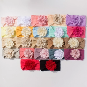 Bandeaux bébé élastiques avec grandes fleurs en tissu en 22 couleurs pour tout-petits