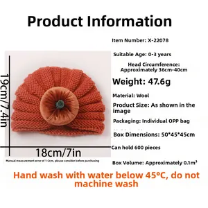 Detailed size chart for orange knitted pumpkin baby hat with green velvet stem
