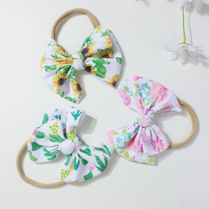 Set di tre fasce per neonati con fiocchi floreali e morbido cinturino elastico in nylon
