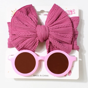 Baby rose red cable knit headband and pink round sunglasses set on white display card