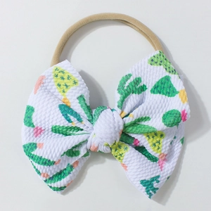 Fascia elastica per neonati con grande fiocco bianco a nido d'ape e stampe di cactus verdi