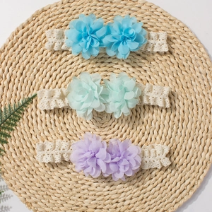 Three-piece baby flower headband set with lace bands in blue, mint, and lavender colors