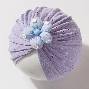 Breathable lavender lace baby turban hat with a decorative blue flower for infants