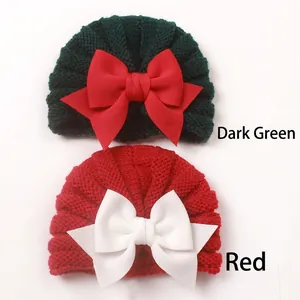 Bonnets tricotés d'hiver pour bébé avec de grands nœuds en vert foncé et rouge