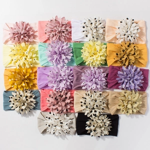 Set of 18 colorful jacquard nylon baby headbands with large handmade floral details