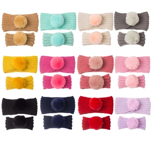 Set of two winter knitted parent-child headbands with faux fur pom poms in twelve colors