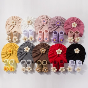 10-piece baby turban hat and socks set with 3D floral accents in assorted warm colors