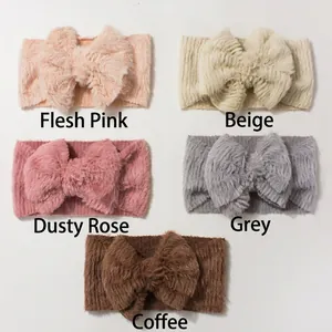 Detail view of plush bow headbands in pink, beige, dusty rose, grey and coffee colors