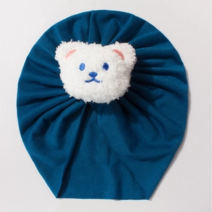 Dark blue baby turban hat with a cute white 3D plush bear patch for infants