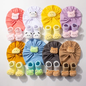 Cute baby turban hat and socks set with cartoon animal designs in various soft colors