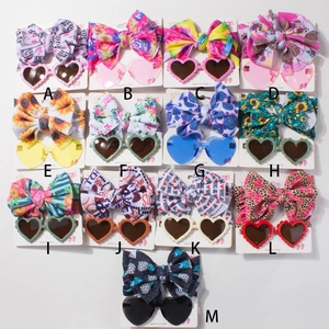 Catalogue détaillé de 13 ensembles bandeau bébé et lunettes cœur aux motifs variés