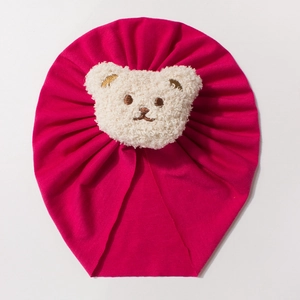 Breathable rose red baby turban hat with a cute beige plush bear ornament