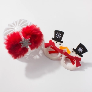Christmas baby set with a red pompom headband and festive snowman decorative glasses