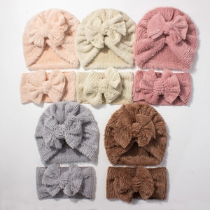 5-piece baby plush headband and hat set featuring oversized bows in various colors