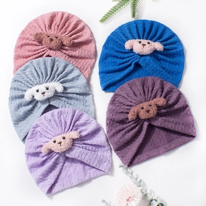 Five pack of baby knit waffle hats with cute puppy patches in assorted colors