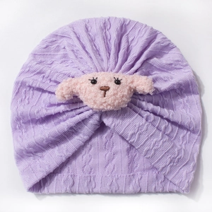 Purple cable knit baby turban hat featuring a cute pink plush sheep decoration
